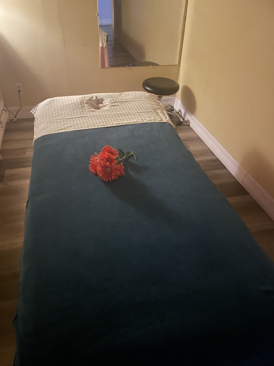 Vertical massage bed setup at Empire Massage and Spa